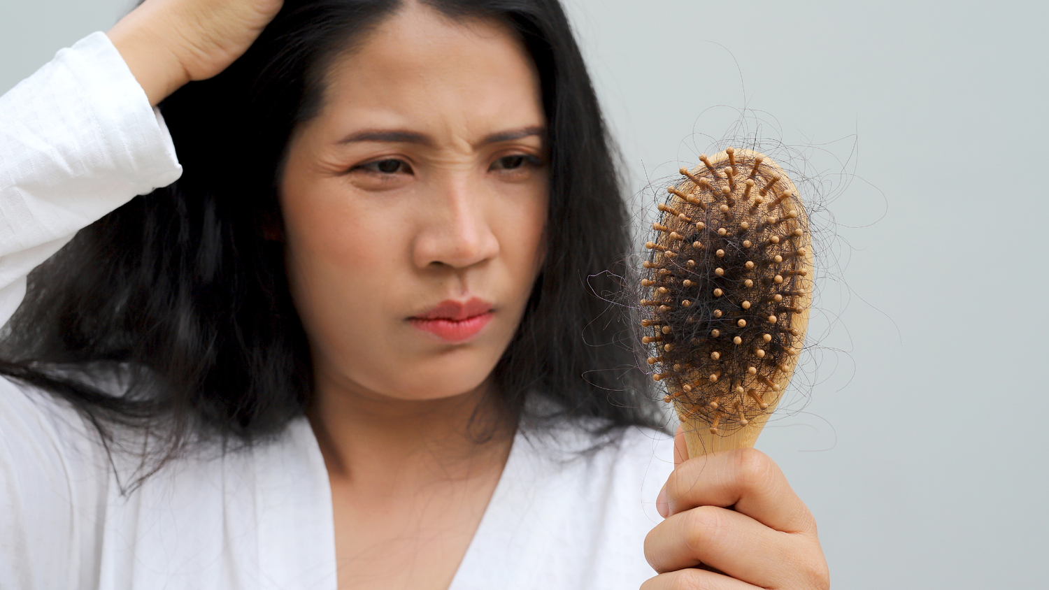 Postpartum mom concerned about excessive hair loss on hairbrush