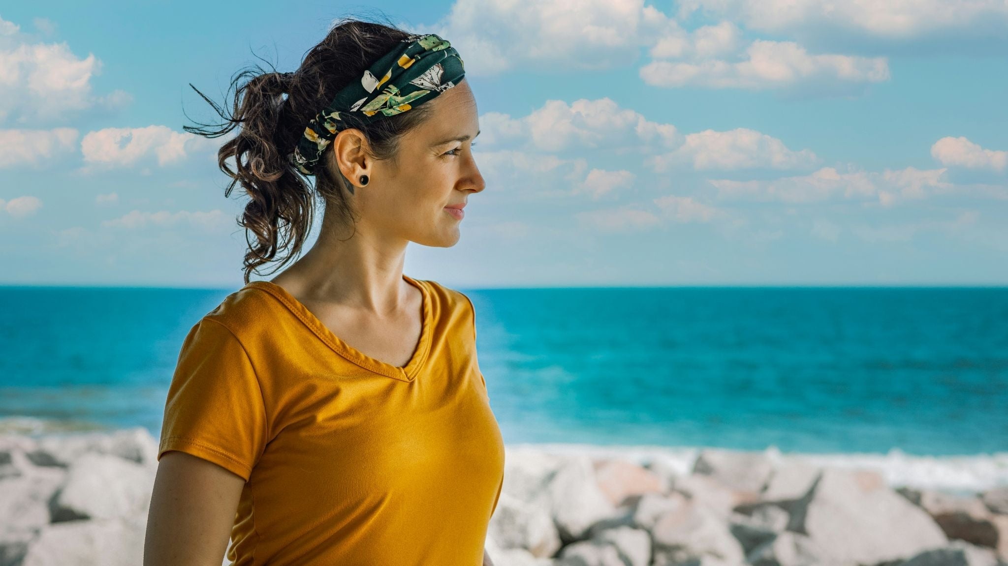 Woman Standing Next to Ocean