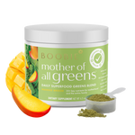 Boobie Mother of All Greens dietary supplement jar with mango slices and scoop on a white background