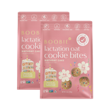 Two packages of Boobie Lactation Oat Cookie Bites Birthday Cake flavor on a white background.