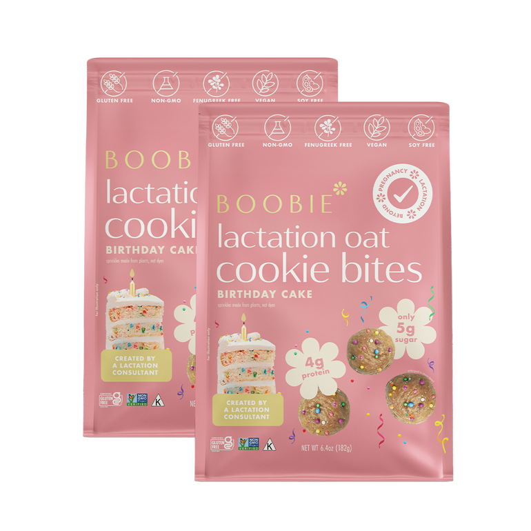 Two packages of Boobie Lactation Oat Cookie Bites Birthday Cake flavor on a white background.