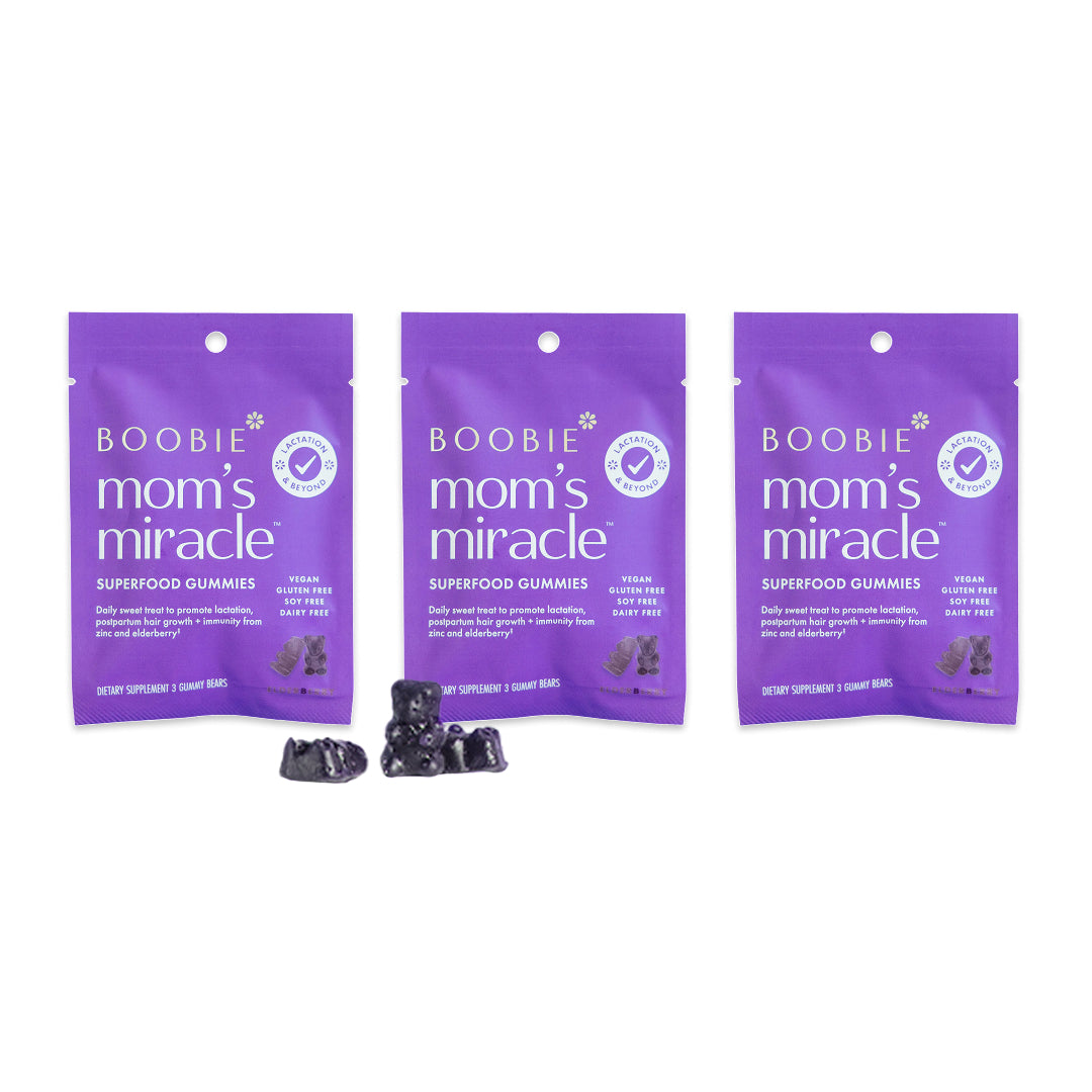 Three packages of Boobie Mom's Miracle Superfood Gummies on a white background
